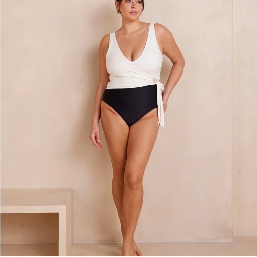 BLACK/ WHITE swimsuit with tie detail. Size 12.